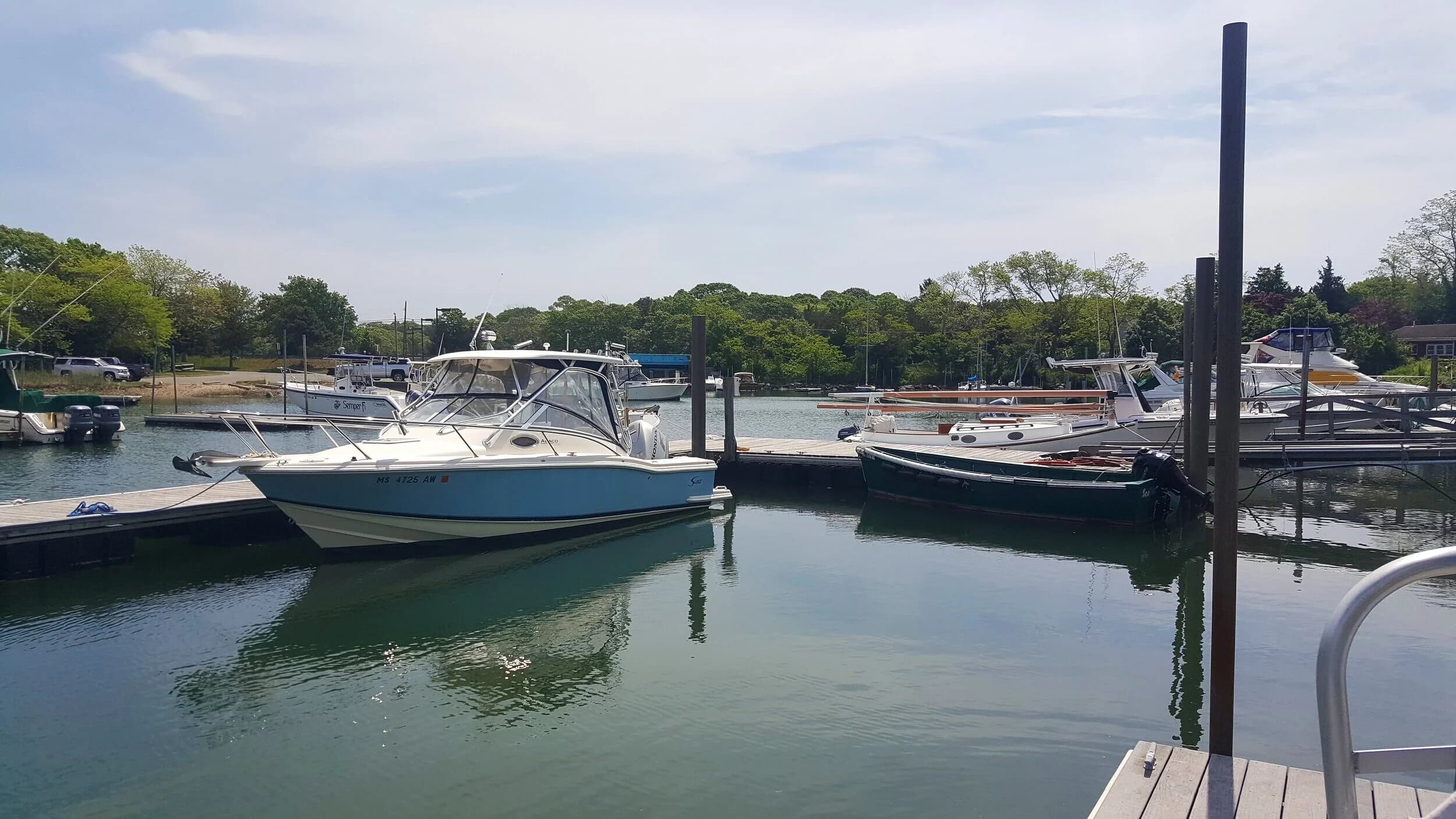 Boats tied up at the floating docks at Scallop Bay Marina