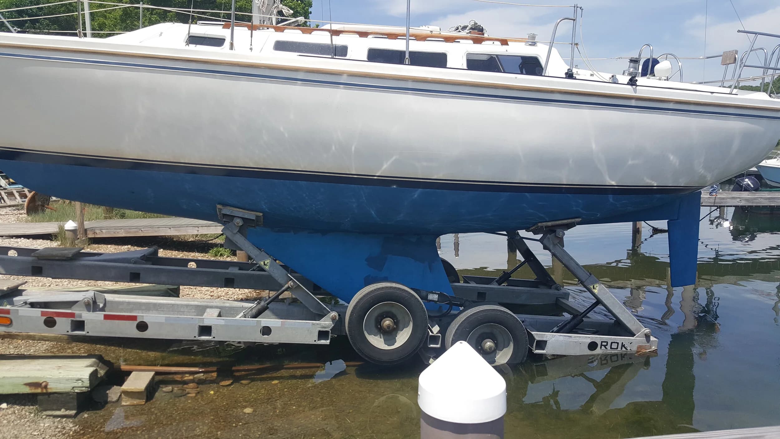 Boats stored on stands in the yard at Scallop Bay Marina